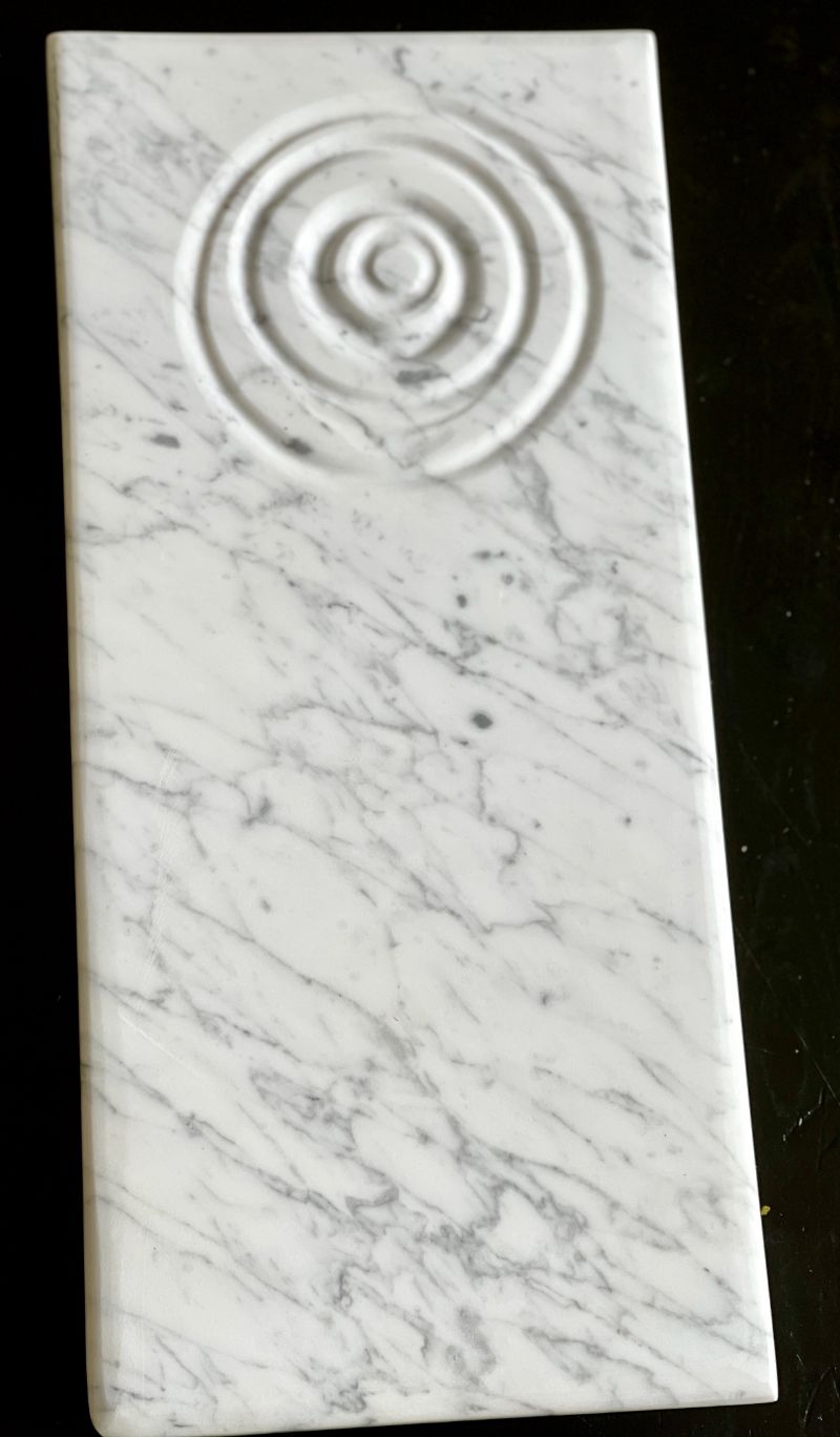 Marble serving board with concentric circles