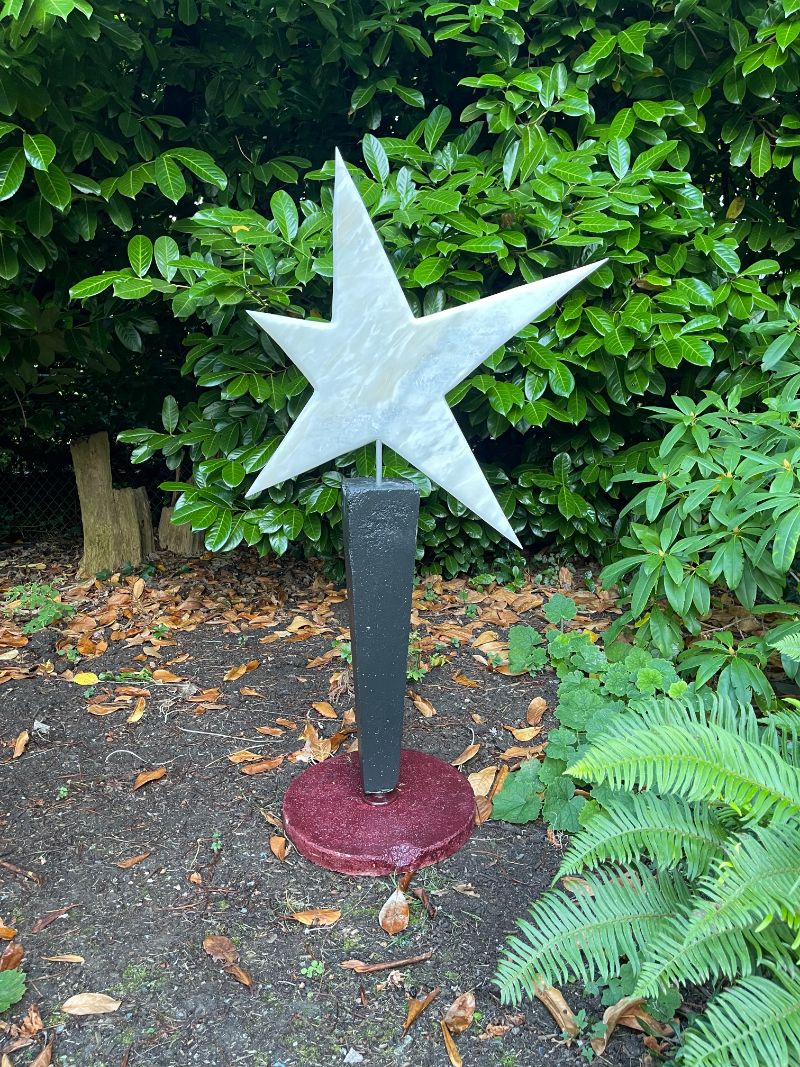 A large marble star for outdoors. Think of it as a big Chuck Taylor star for your garden